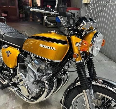 The 1969 Honda CB 750 four motorcycle! was the first motorcycle to be called a superbike.( in lovely candy Gold color)